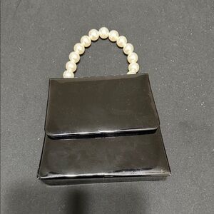 Sleek Black Mini Bag with Pearl Handle vintage